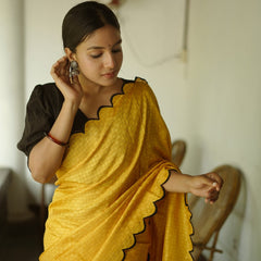 Yellow Color Gadhawal Chex Material & Arca Work Saree