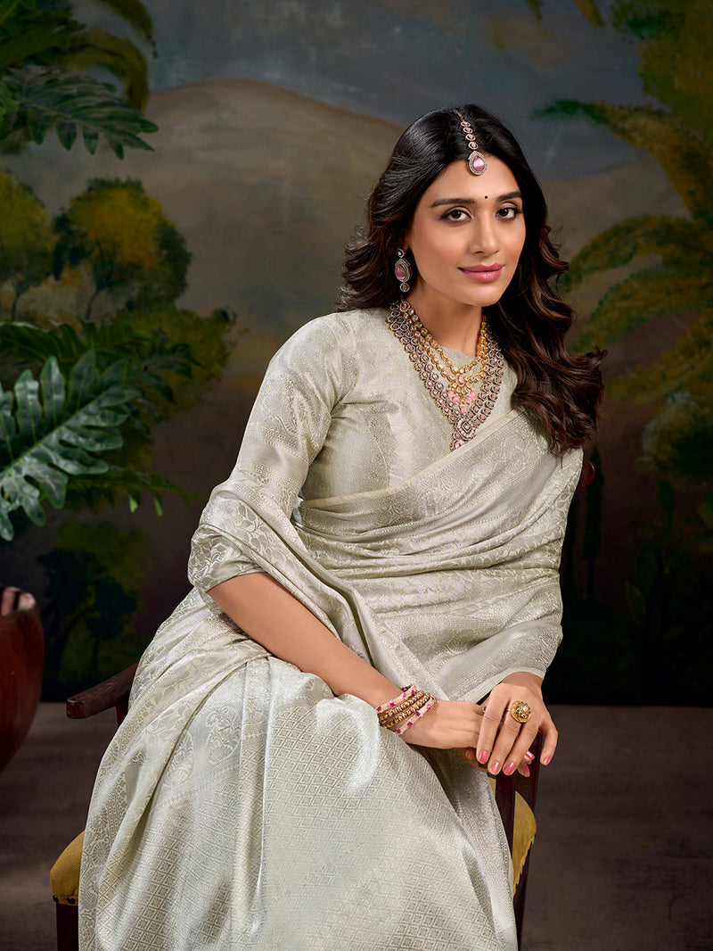 Off White Color Zari Weaving Work With Kanjivaram Saree