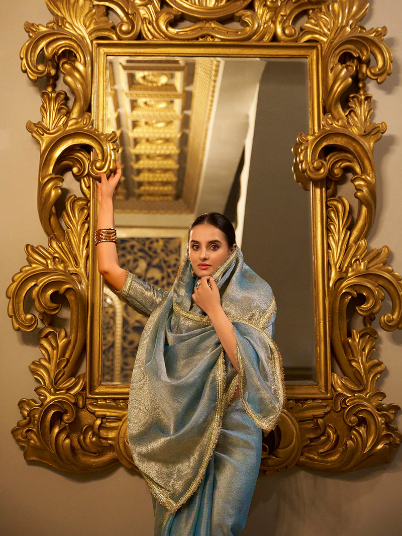 Sky Blue Color Zari Weaving Work With Sequins Border Tissue Shimmer Saree
