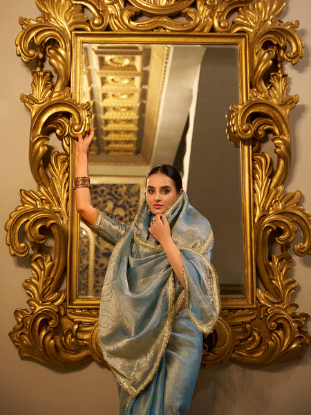 Sky Blue Color Zari Weaving Work With Sequins Border Tissue Shimmer Saree